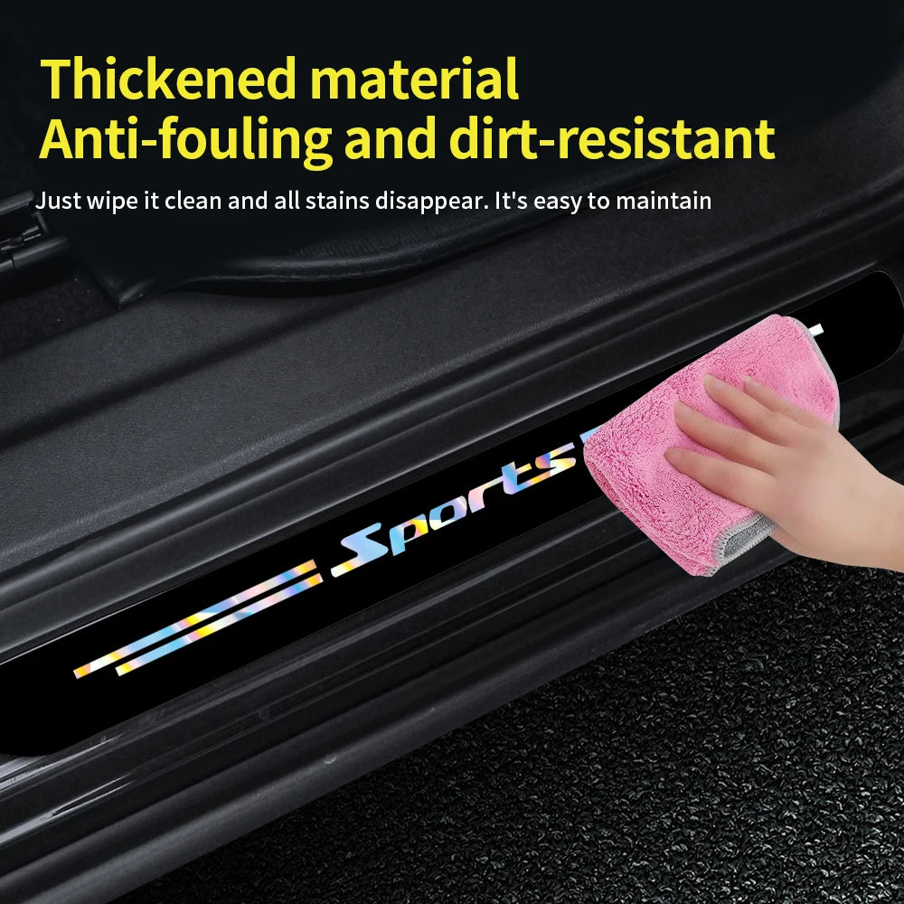 A hand wipes a black car door sill protector strip with a pink cloth.