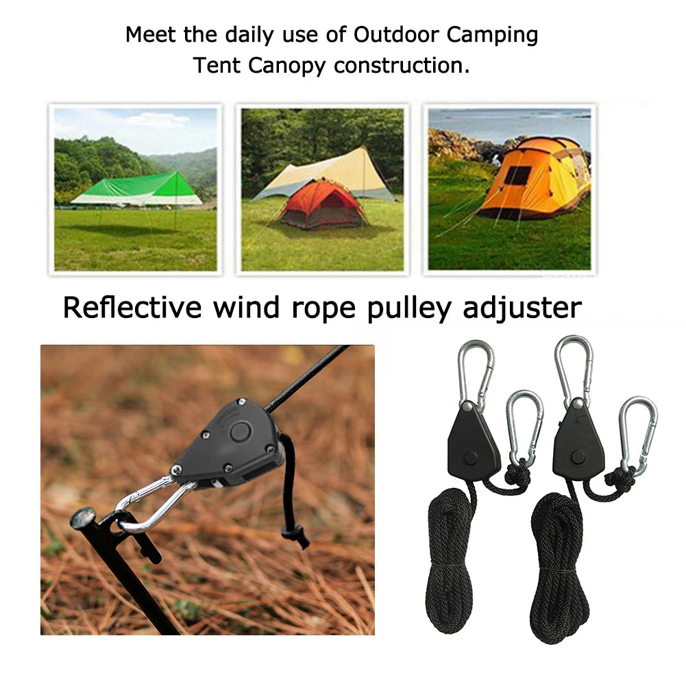 A close-up of reflective wind rope pulley adjusters and hooks used for tensioning camping tents.