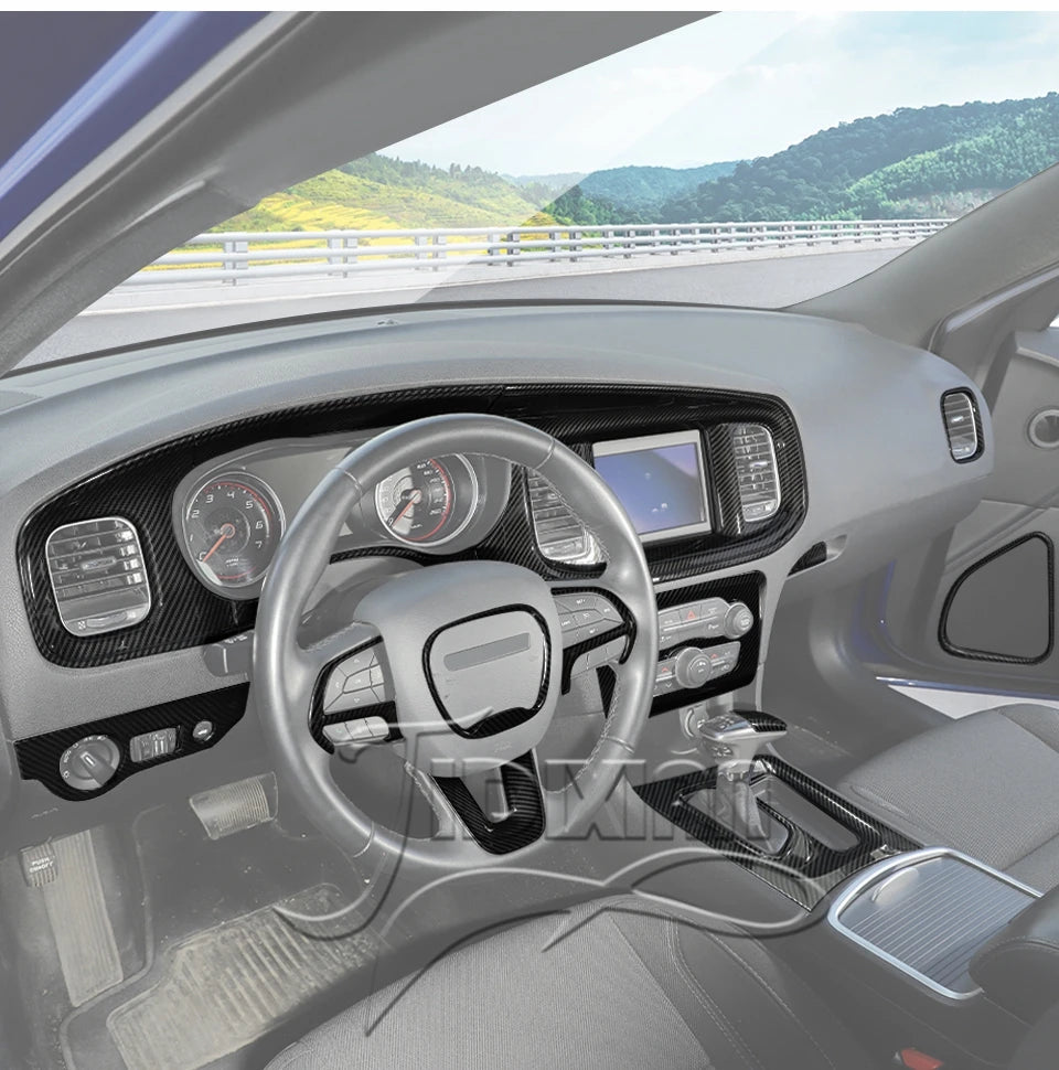 Interior view of a Dodge Charger showing carbon fiber trim and steering wheel for a custom kit.