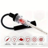 Automotive spark plug ignition tester with diagnostic gauge shown in a clear plastic and black housing