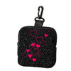 Black mini coin purse with a leopard print design and a black strap.