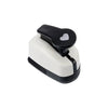 A black and white heart-shaped paper punch set for crafting.
