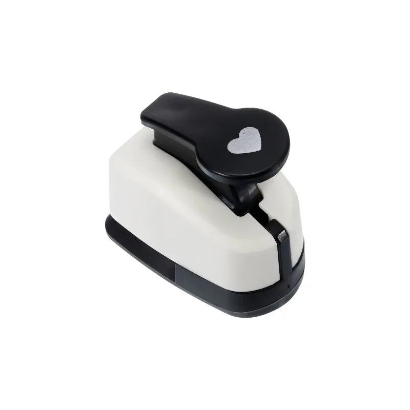 A black and white heart-shaped paper punch set for crafting.
