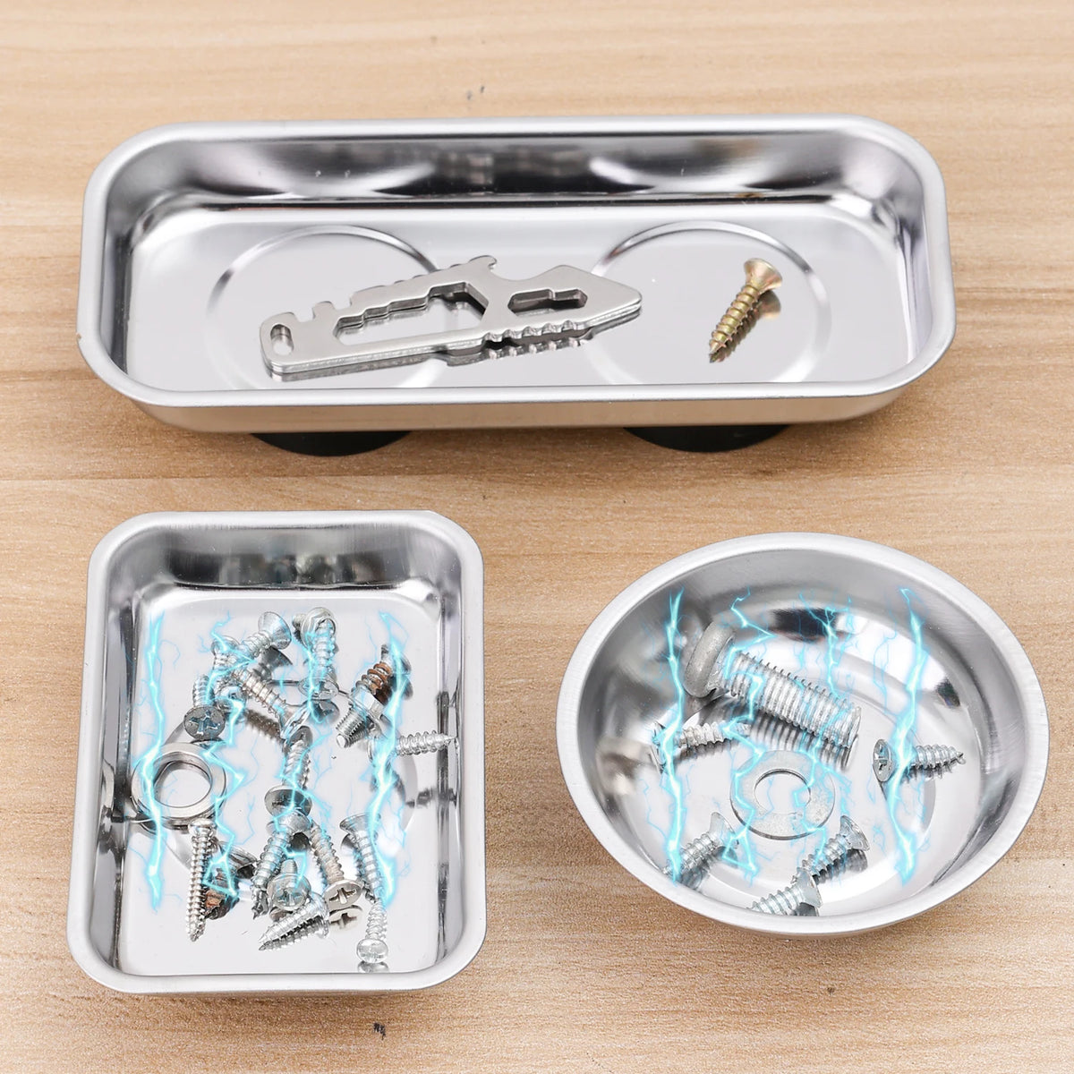 A silver magnetic parts tray with a strong magnet base, showing various hardware like screws and a key.