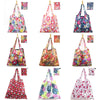 A collection of colorful floral print reusable shopping totes and carry pouches in various shades.