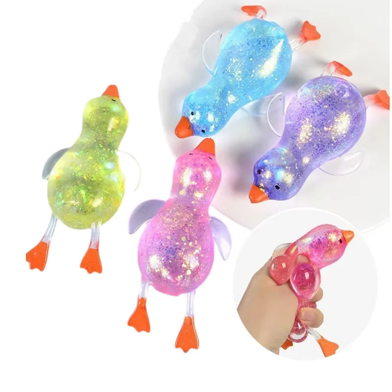 Glitzer-Enten-Kuscheltier zum Stressabbau in verschiedenen Farben wie Blau und Lila