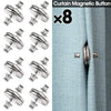 Eight silver magnetic curtain buttons used to fasten a light blue fabric.