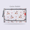 A zippered storage bag for an Easter rabbit themed foldable baby changing mat.