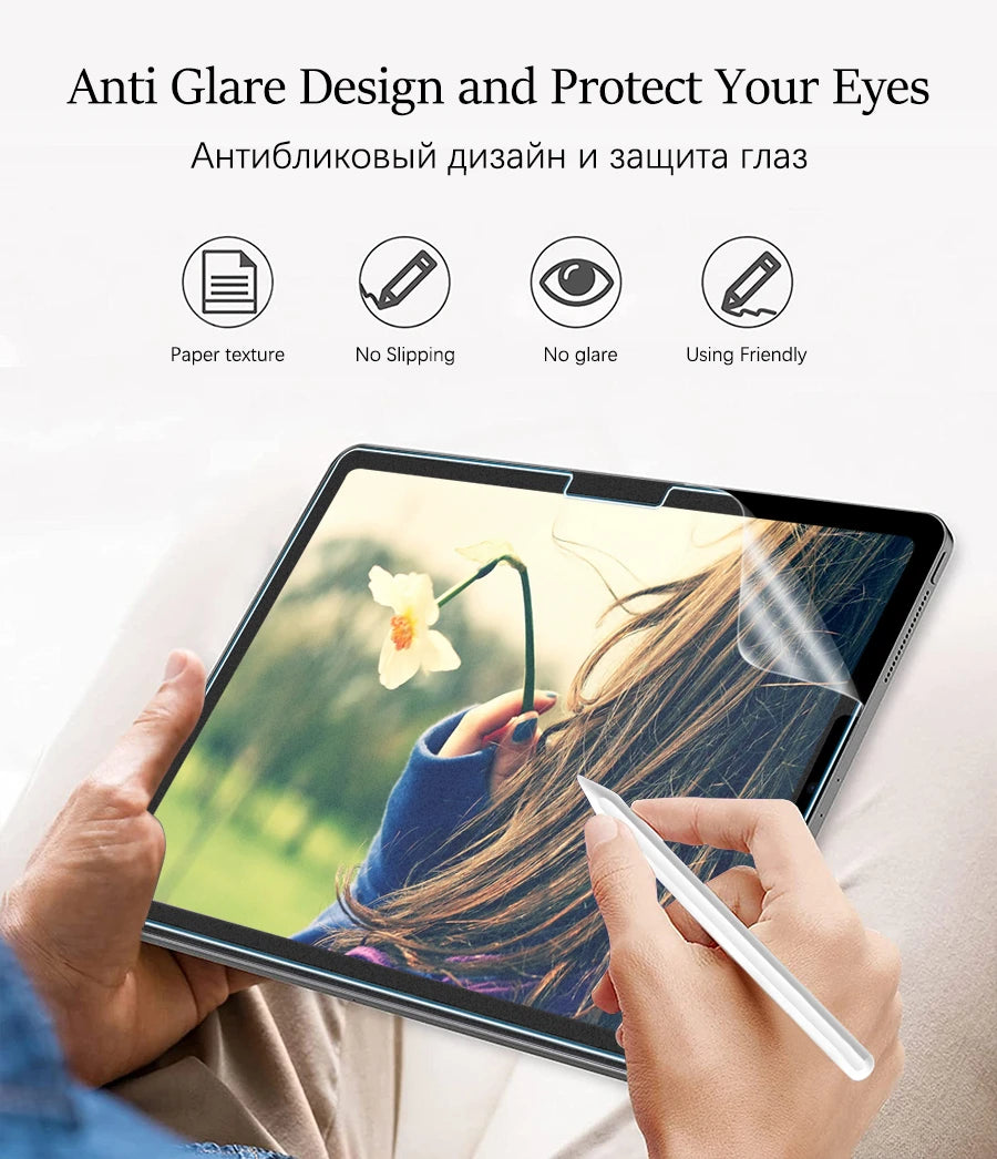 A hand is using a paper texture screen protector on an iPad, demonstrating anti-glare and safe usage.