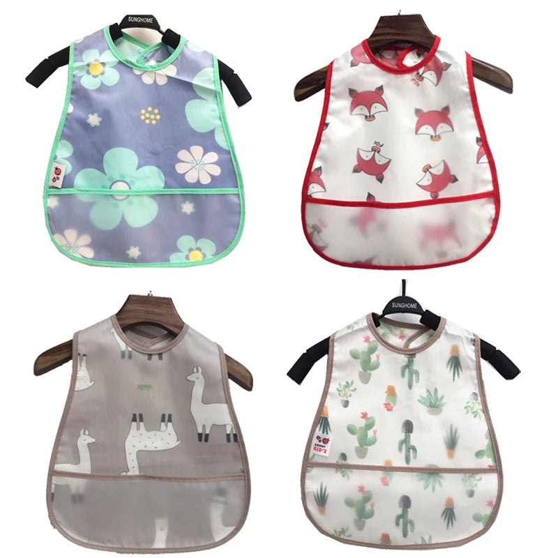 A collection of baby feeding bibs featuring various patterns and colors for infants.