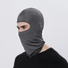 A man wearing a dark gray windproof full face balaclava.