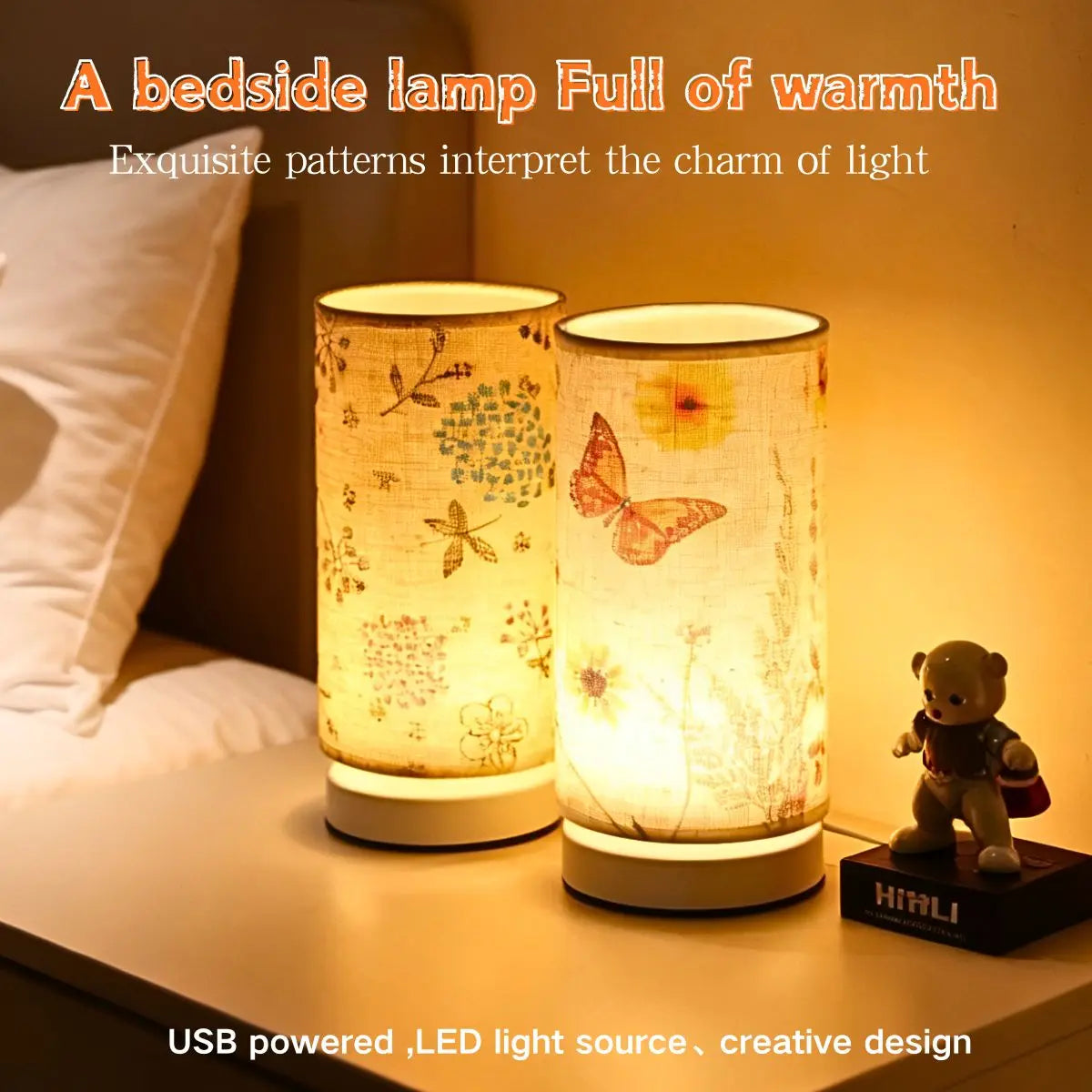 A bedside lamp with a fabric shade featuring exquisite patterns, powered by USB.