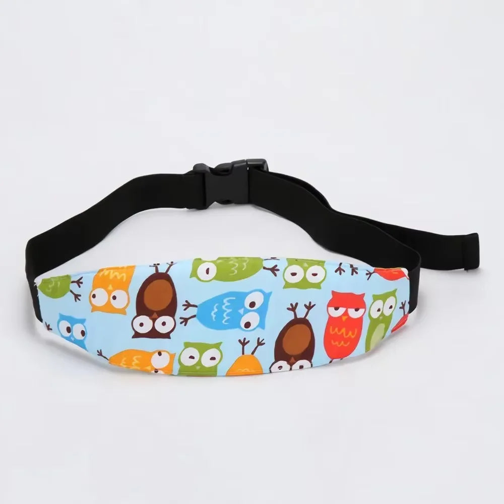 A colorful sleeping headrest for a baby car seat featuring various owl designs.