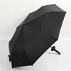 A black, anime-inspired folding parasol or umbrella is shown against a white background.