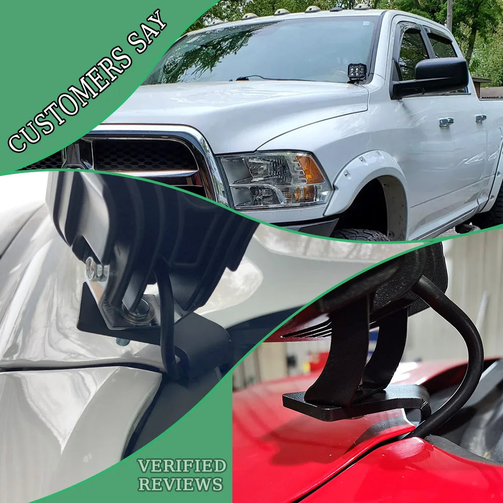 Close-up of a white Dodge Ram hood LED light mounting bracket and antenna mount installed on the front of a truck.