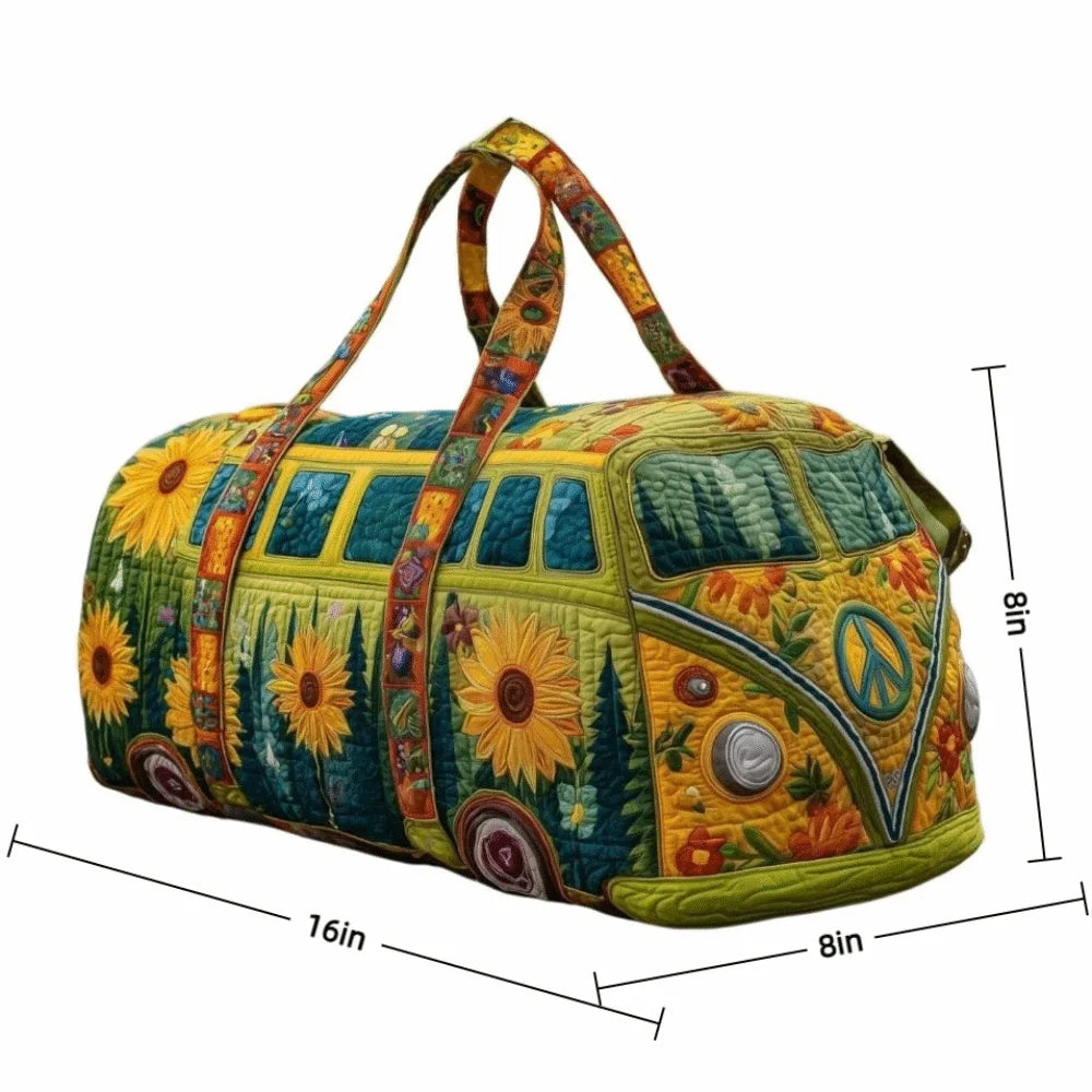 A quilted travel duffle bag featuring a yellow and green floral pattern with 3D stitching.