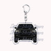 A durable metal key ring featuring a silhouette of an off-road truck.
