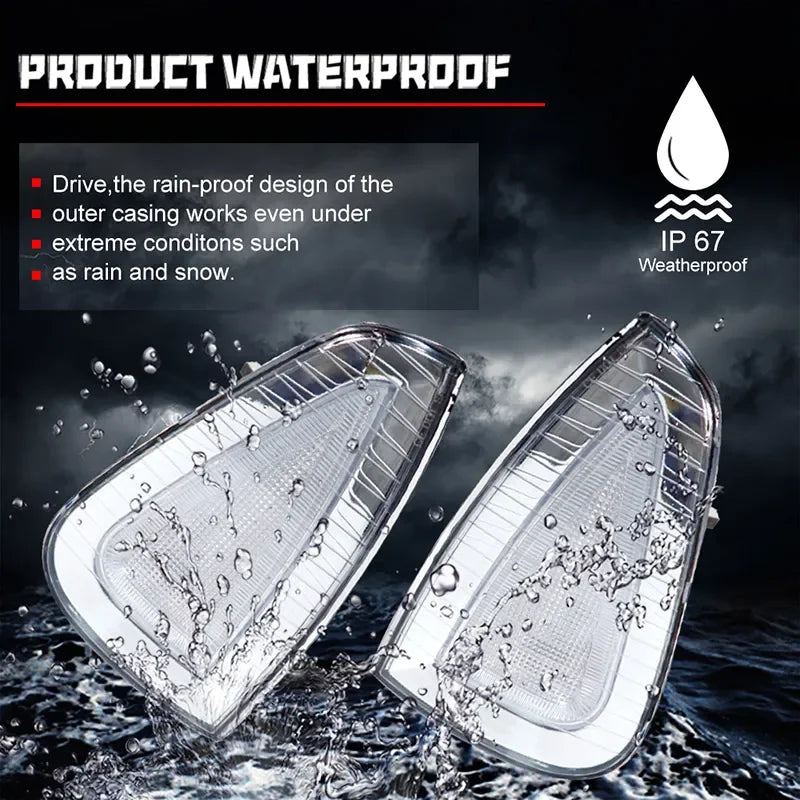 Two clear automotive front side marker light housings being washed by water droplets.