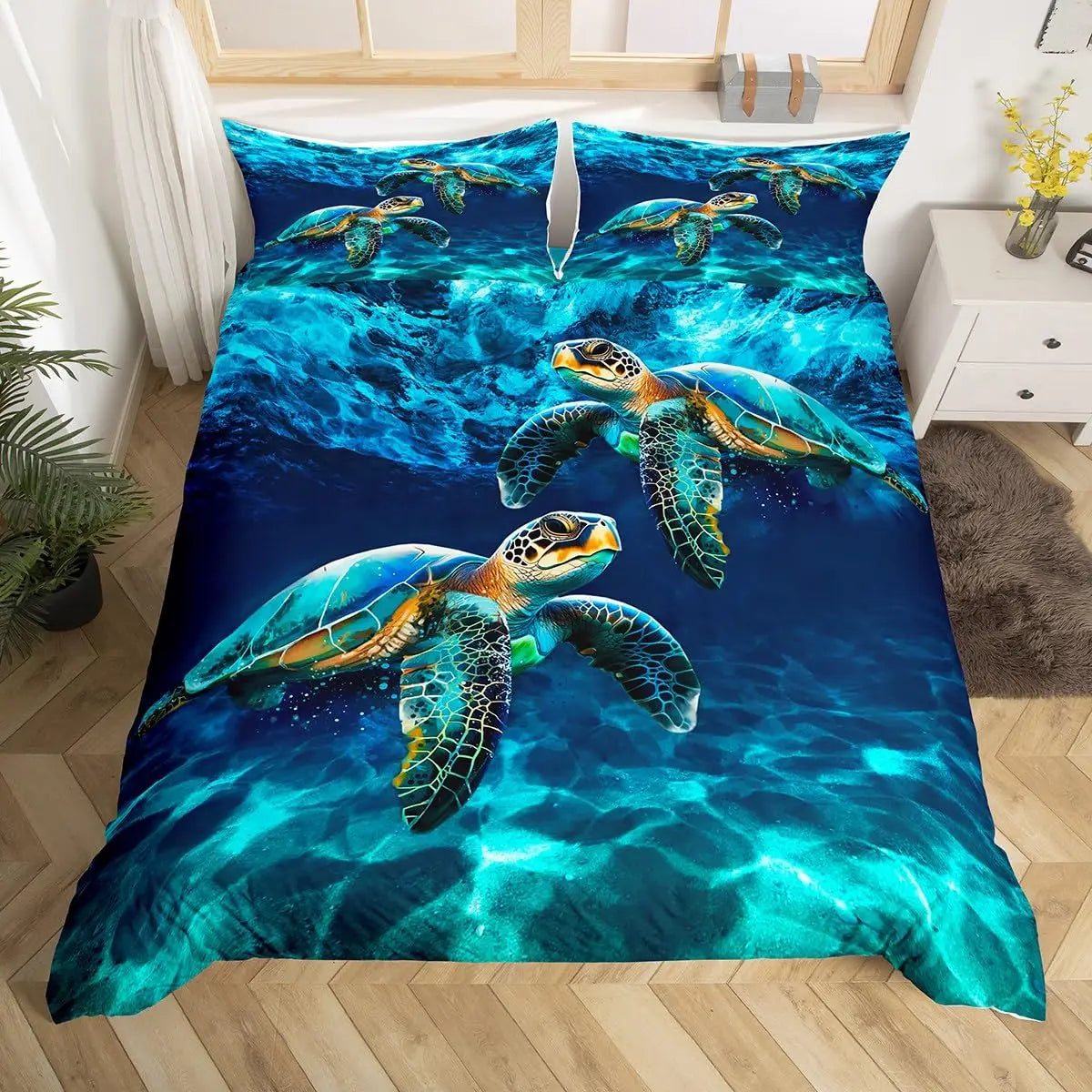 A vibrant blue sea turtle design printed on a duvet cover featuring multiple turtles swimming in clear water.