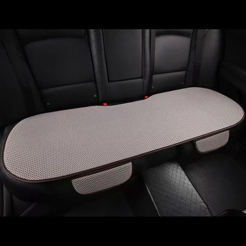 A black car seat with a gray breathable ice silk cushion installed on the seat.
