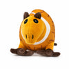 An orange and white plush toy of a shark with large eyes and small ears.