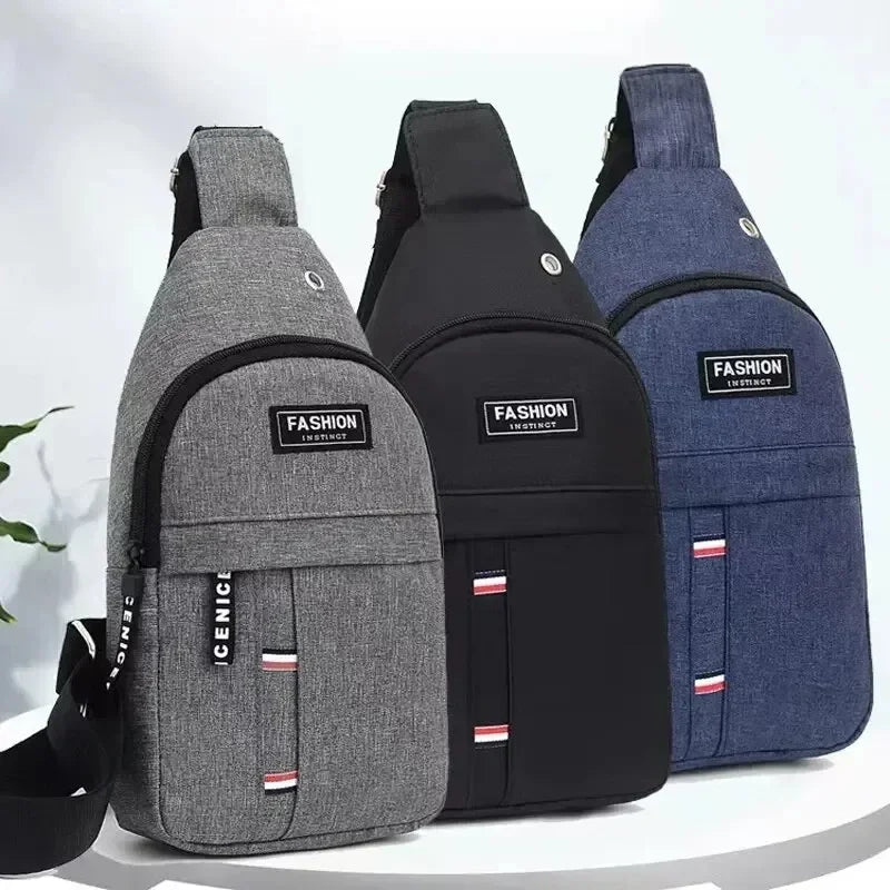 Three gray and black fanny packs displayed side by side with adjustable straps.