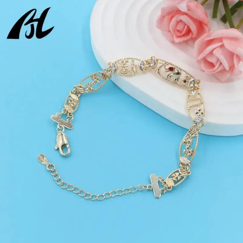 Symbolic Charm Bracelet with Elephant, Horseshoe & Evil Eye Pendants