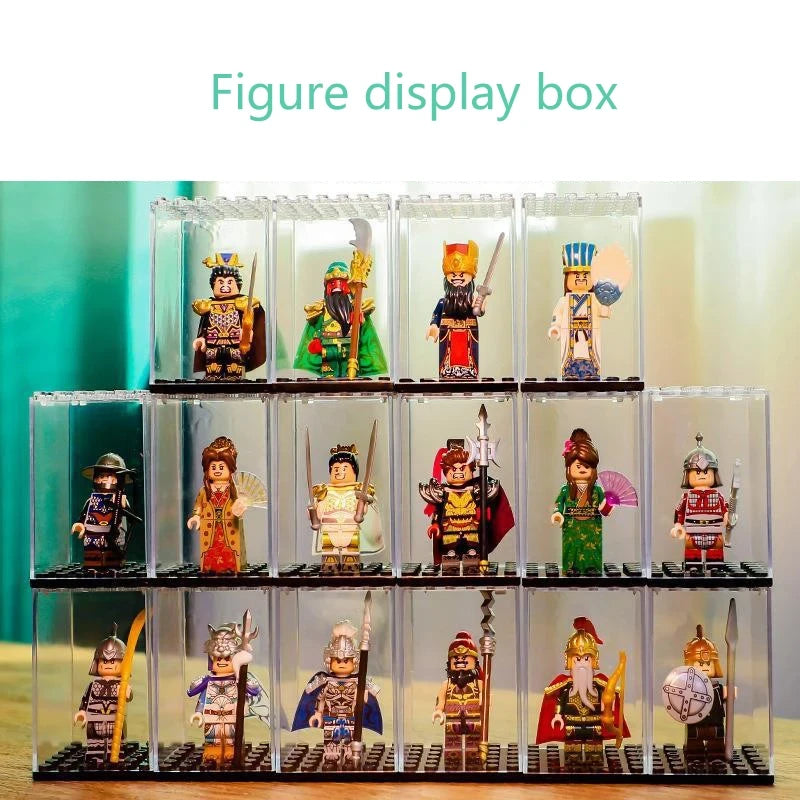 A display box showing various miniature figurines and collectibles arranged in clear acrylic cases.