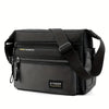 Black men's water-resistant nylon crossbody sling bag with a padded strap