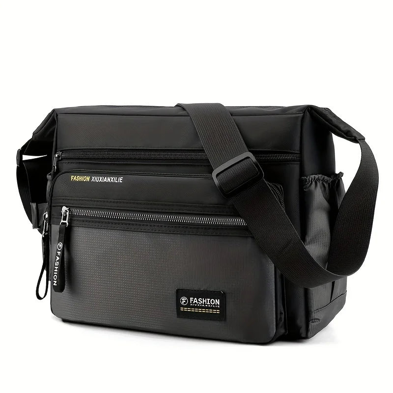 Black men's water-resistant nylon crossbody sling bag with a padded strap
