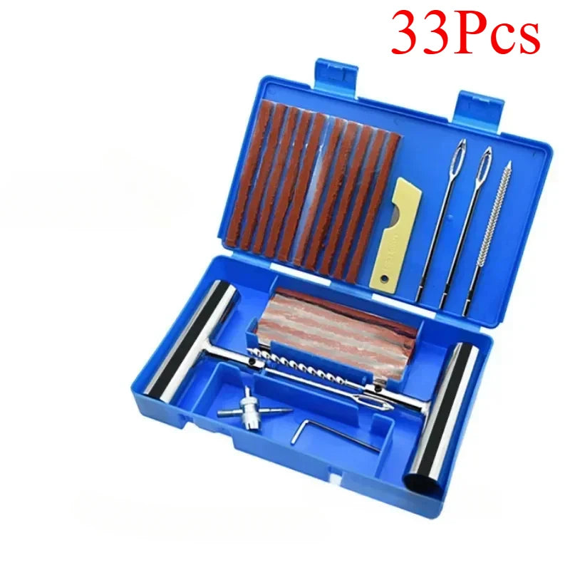 An open blue kit containing 33 pieces of tools for portable tire repair, including various wrenches and tools.