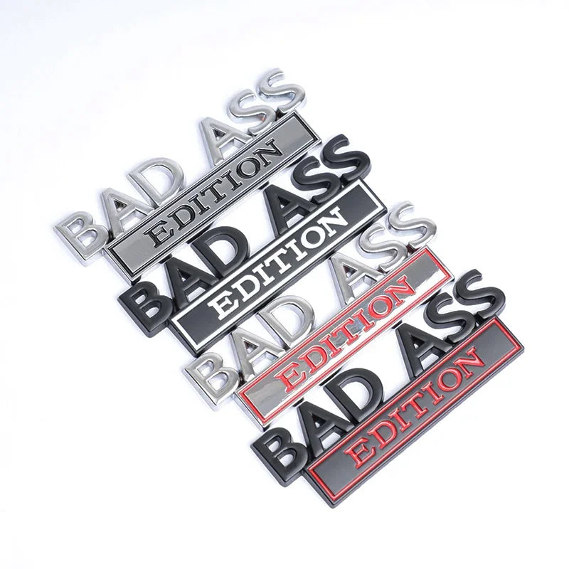A set of silver and red 3D metal chrome badge emblems with the text BAD ASS EDITION