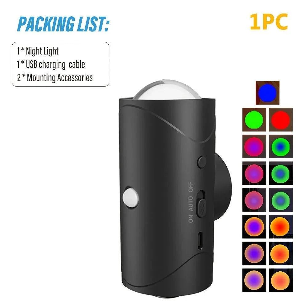 A black rechargeable motion sensor RGB LED night light with a round lens and an on/off switch.