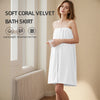 A woman models a white soft coral velvet bath skirt or towel in a light indoor setting.
