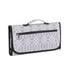 A gray and white patterned foldable waterproof baby changing pad with a black handle.