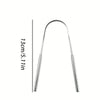 Stainless steel tongue scraper with a handle, shown vertically.