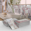 A collection of marble self-adhesive wall stickers in various shades and patterns displayed on a white surface.