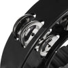 Close-up of a black half-moon tambourine with double row metal jingles.