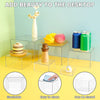 Stackable acrylic display risers used to elevate desserts and party items on a desktop.