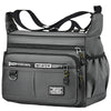 A gray men's business crossbody bag with multiple zippered pockets and adjustable straps.