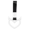 A white heart-shaped ring drift handle with a black strap.