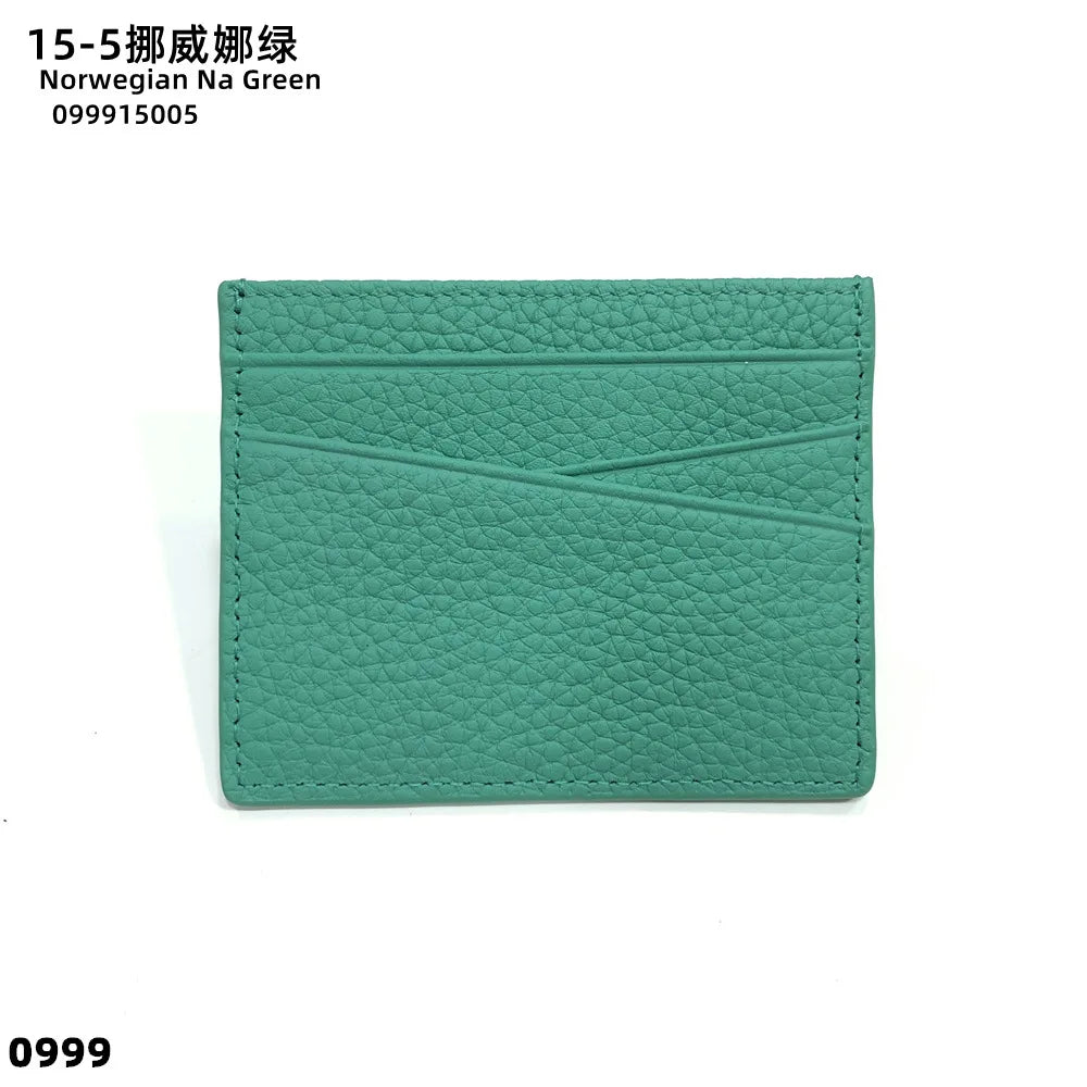 A teal genuine leather slim card holder wallet with a quilted texture.