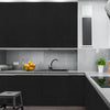 Modern kitchen cabinet and countertop featuring dark gray wood grain finish.