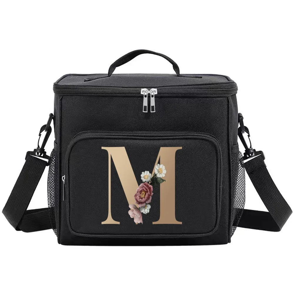 Black insulated canvas lunch bag with a gold initial M and floral embroidery