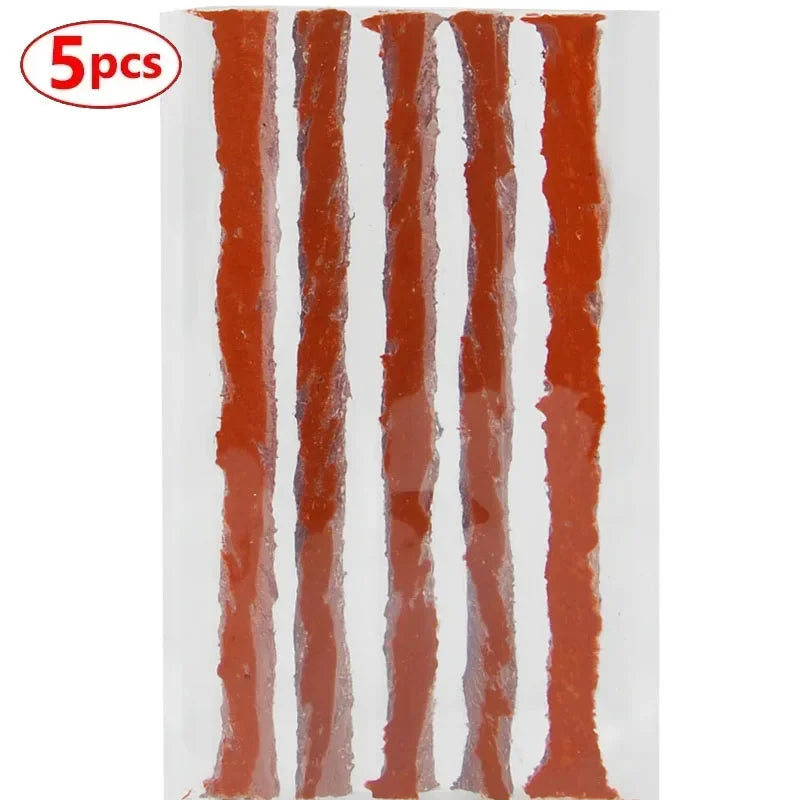 Five tubes of red sealant or repair material are shown vertically in a white container.