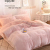 A pink plush mink velvet duvet cover set displayed on a bed with soft lighting.