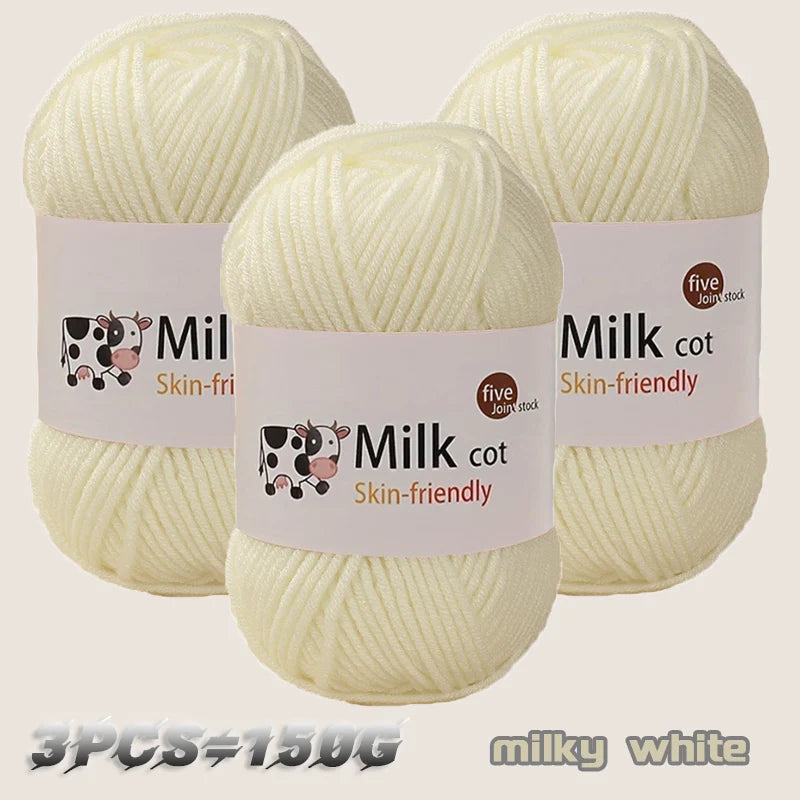 Three skeins of milky white cotton yarn are displayed, labeled as skin-friendly and suitable for knitting or crochet.