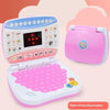 Pink LCD learning machine toy with a pink case and keyboard visible against a light background.
