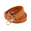 A coiled tan leather strap with a gold-toned buckle is shown.