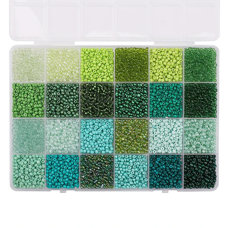 A storage box filled with various colors of 3mm acrylic rice beads in a 24-grid arrangement.